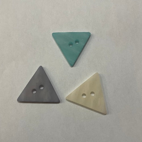 Large plastic triangle statement buttons