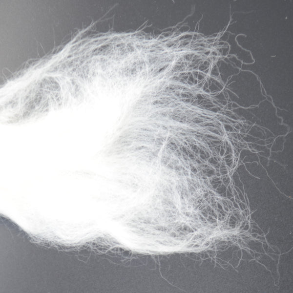 close up of Perendale wool roving carded unspun wool from the Perendale sheep showing the fibre detail