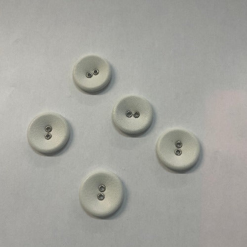 two-hole white buttons in faux leather with metal findings