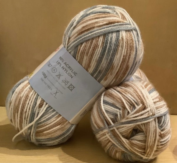 James C Brett Magi Knit brown, white, and gray