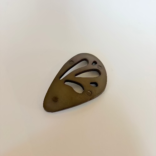Plastic "wing" statement buttons