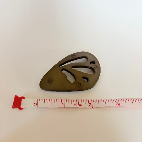 Plastic "wing" statement buttons