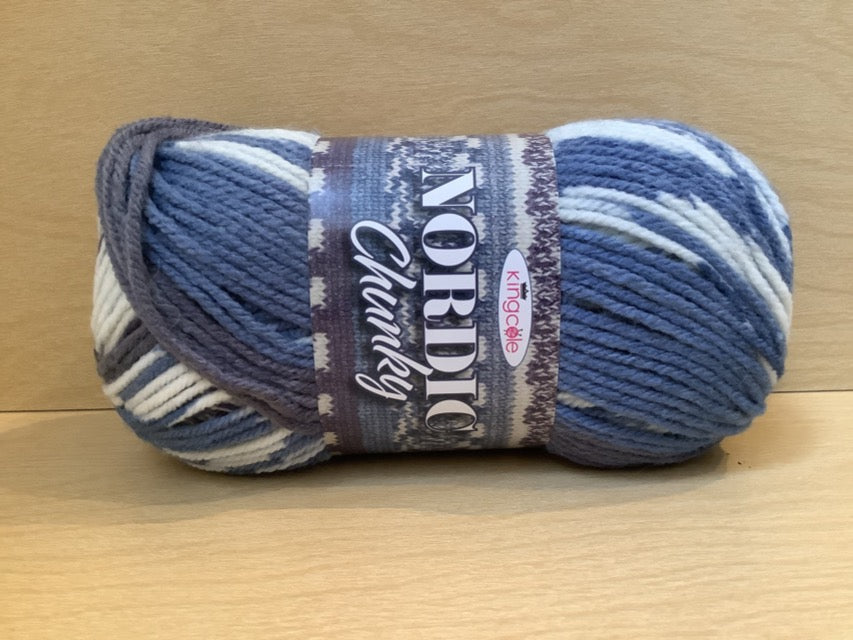 Color 4807 Frida. Blue, darker blue, and off white variegated yarn