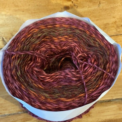 Pale purple with brown Cone sock yarn