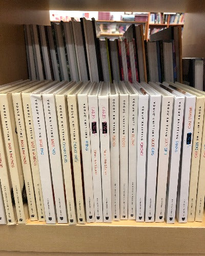 bookshelf at romni wools showing book series vogue knitting on the go