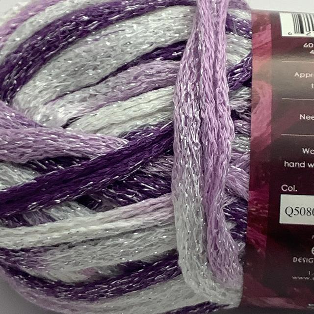 A purple to white mesh yarn with silver shimmer