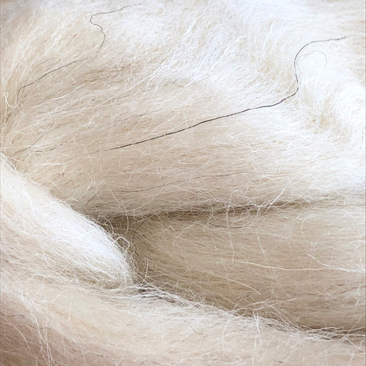 stricken scandinavian mountain wool roving showing natural black hairs